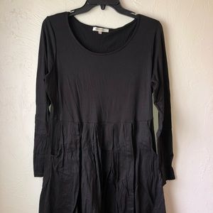 Simple short black dress with pockets